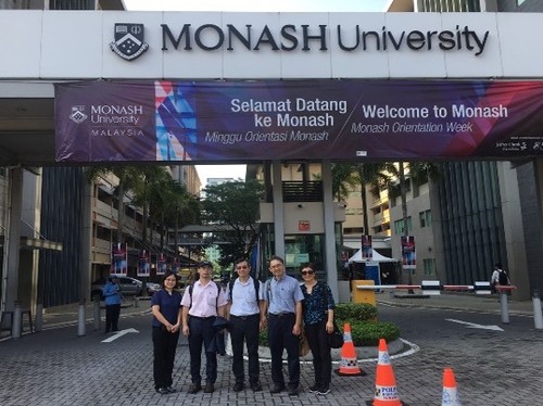 Picture-taking session in front of the school of Monash University