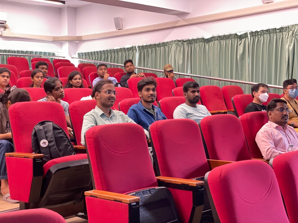 students listening to lectureImage