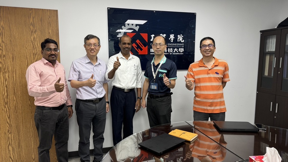 group picture of professors and scholarImage